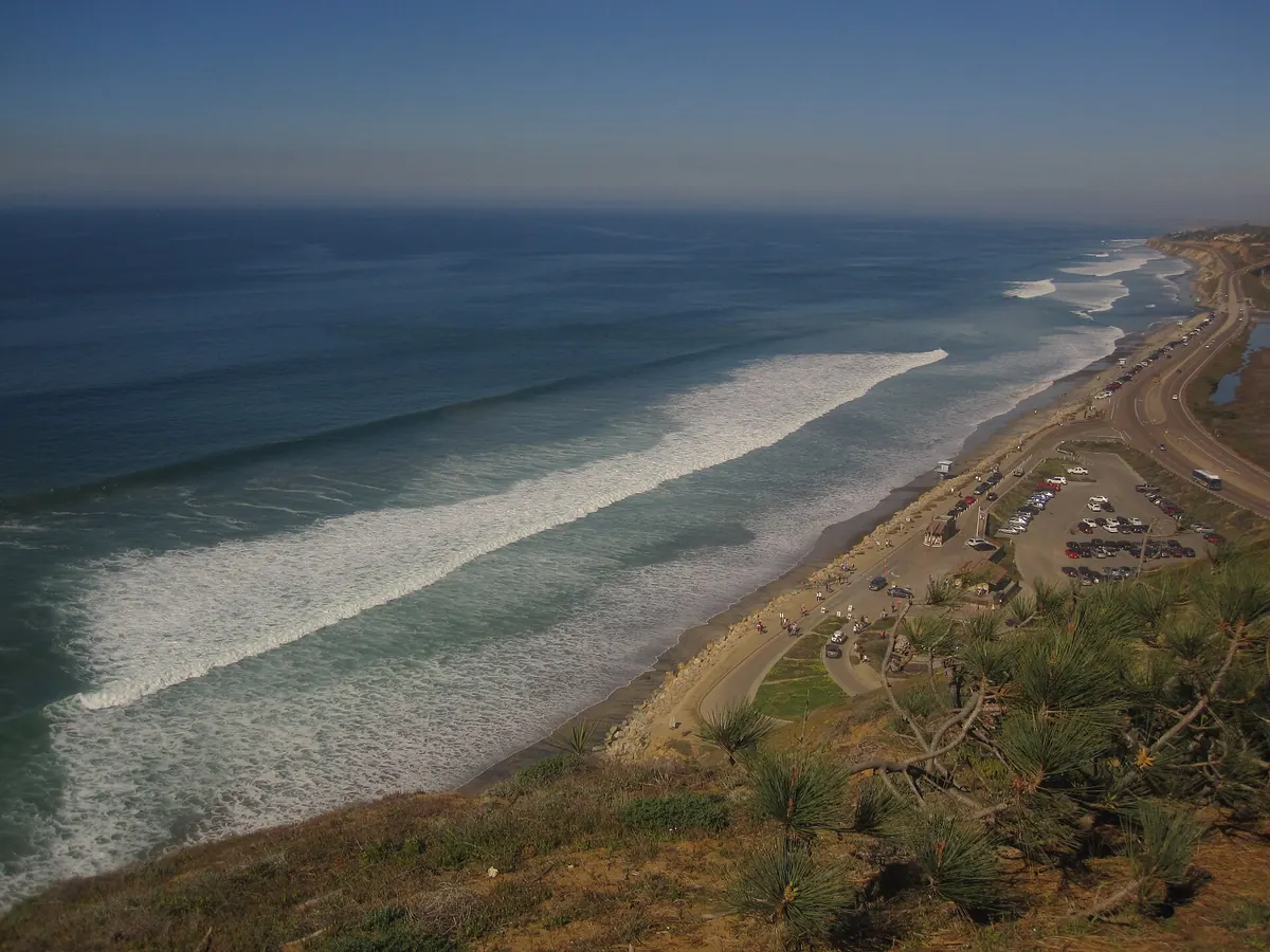 Old Highway 101 running along Torrey Pines State Beach below the Torrey Pines bluffs